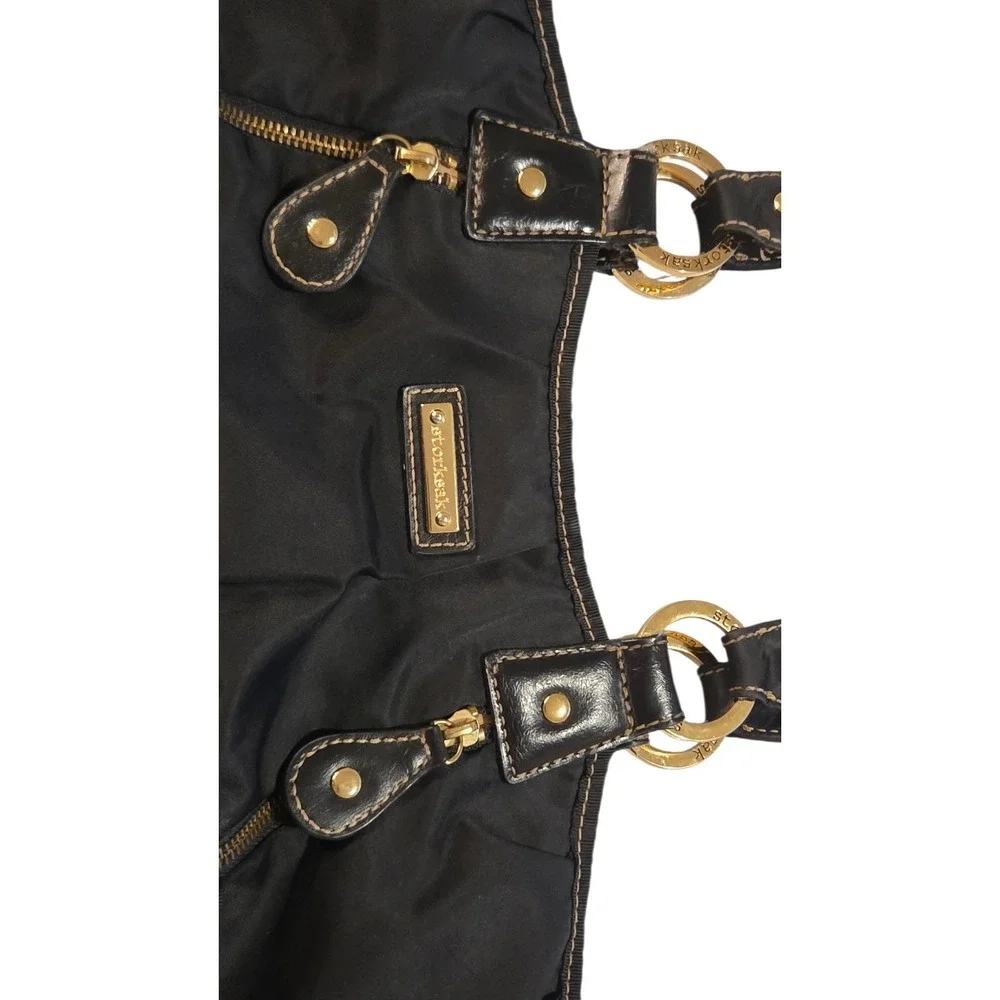 Storksak Olivia Diaper Bag Black Satin Nylon Multiple Pockets‎